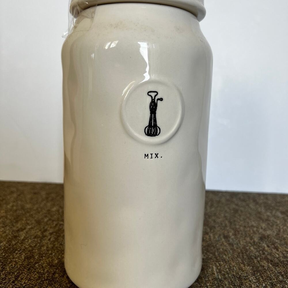 RAE DUNN ceramic ivory canister 10 1/2” tall